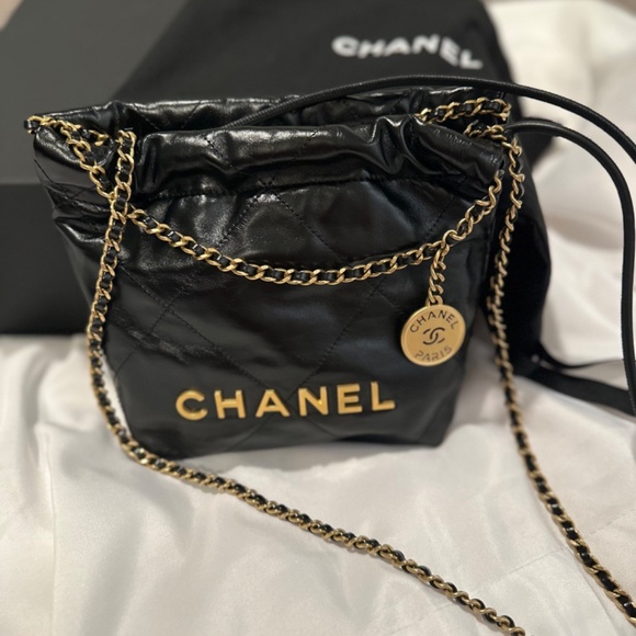 CHANEL Handbags - CHANEL Pristine Black Quilted Leather Mini 22 Chain Bag